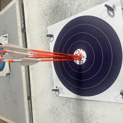 Tight arrow group in the bullseye